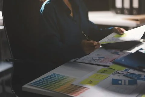 Team of Program Developer Collaborating on UXUI Design Planning in a Modern.. Stock Photos