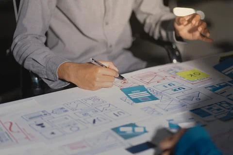 Team of Program Developer Collaborating on UXUI Design Planning in a Modern.. Stock Photos