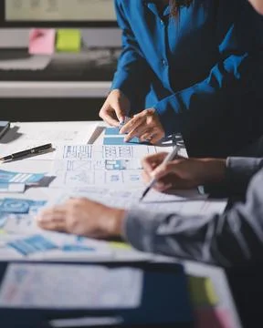 Team of Program Developer Collaborating on UXUI Design Planning in a Modern.. Stock Photos