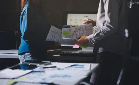 Team of Program Developer Collaborating on UXUI Design Planning in a Modern.. Stock Photos