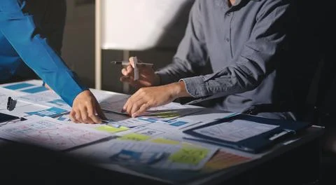Team of Program Developer Collaborating on UXUI Design Planning in a Modern.. Stock Photos