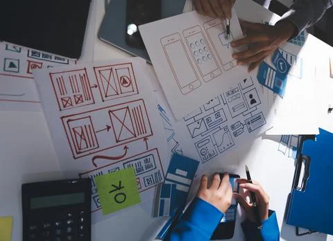 Team of Program Developer Collaborating on UXUI Design Planning in a Modern.. Stock Photos