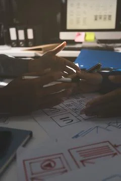Team of Program Developer Collaborating on UXUI Design Planning in a Modern.. 写真素材