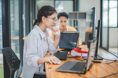 Team programmer focuses on software development, site design, and the advan.. Stock Photos