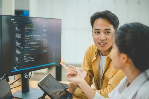 Team programmer focuses on software development, site design, and the advan.. Stock Photos