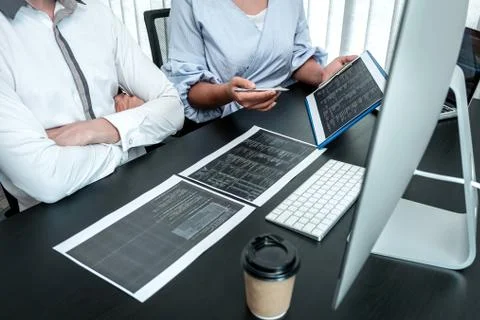Team of Programmer working in software javascript computer in IT office, Writ Stock Photos