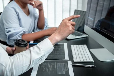 Team of Programmer working in software javascript computer in IT office, Writ Stock Photos