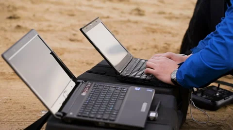 The team of programmers and technicians customizes equipment. They are engaged Video stock 62651837