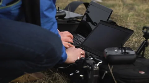 The team of programmers and technicians customizes equipment. They are engaged Stock Footage 62652859