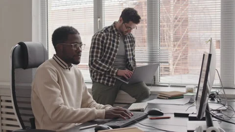 Team of Programmers Coworking in Office Stock Footage 165214716