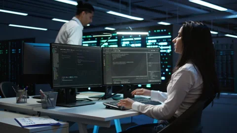 Team of programmers in data center responsible for repairs Stock Footage 280723923