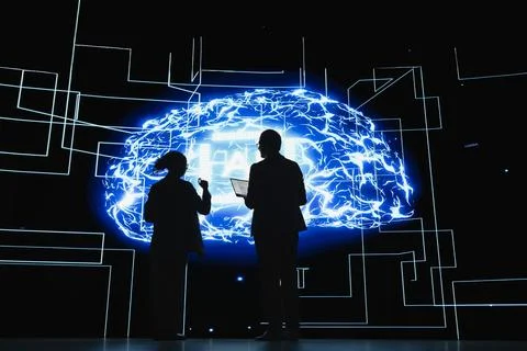 Team of programmers do research and development on AI technology Foto stock