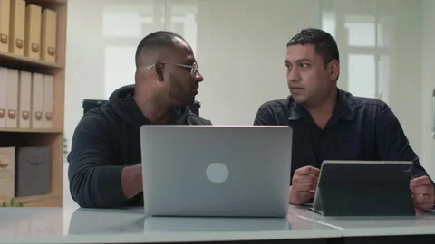 Team of Programmers Sharing Ideas about New Software Stock Footage 252570485