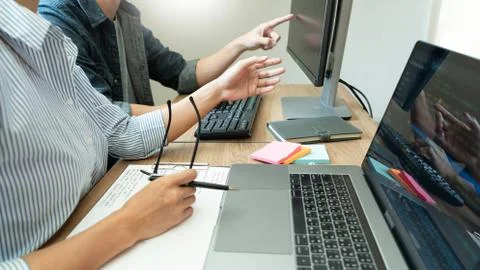 Team of programmers working together development Website design and coding te Stockfoto's