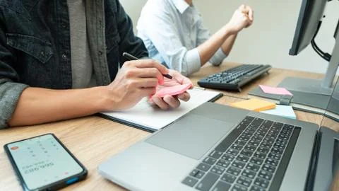 Team of programmers working together development Website design and coding te 库存照片