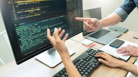Team of programmers working together development Website design and coding... Stock Photos
