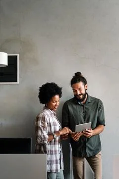Team of programmers writing digital code in the metaverse and working together Foto stock