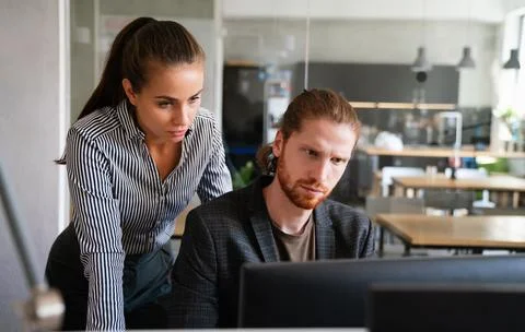 Team of programmers writing digital code in the metaverse and working together Foto stock