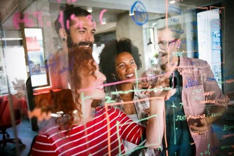 Team of programmers writing digital code in the metaverse and working together Stock Photos