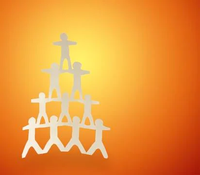 Team pyramid on orange background Stock Photos