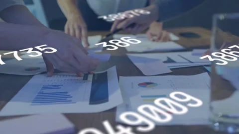 Team reaching in sorting data charts aligning docs while numeric digits Stock Footage 335211849