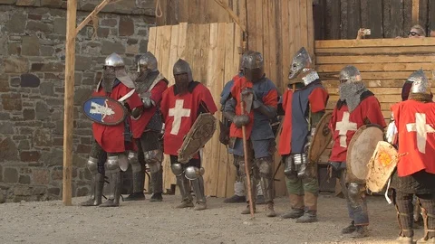 Team of red and blue plated warriors prepare to battle Stock Footage 100151048
