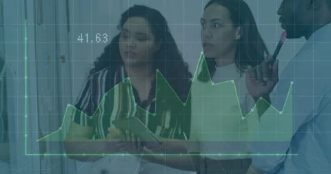 Team referencing tablet and marking data trends on grid overlay while man Stockbeeldmateriaal 313307710