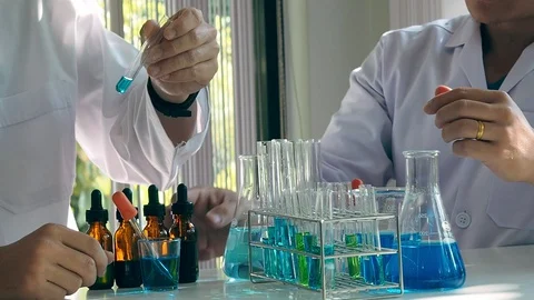 Team of researcher or scientists working in laboratory. Stock Footage 127844570