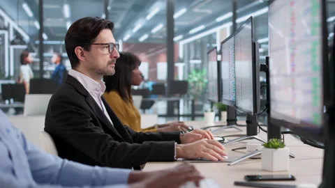 Team Reviewing Bills Using Software And Computers Stock Footage 330584039