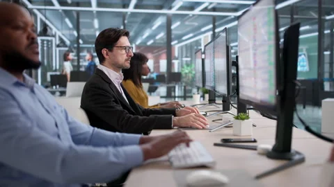 Team Reviewing Bills Using Software And Computers Stock Footage 331153193