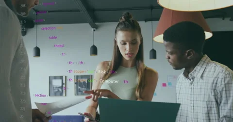 Team reviewing cybersecurity layout on laptop with printouts sparking HTML Stock Footage 315596960