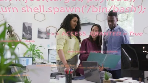 Team reviewing teal folder at desk, laptop showing ACCESS_GRANTED, red code Stock Footage 333154320