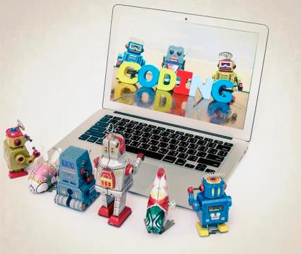 A team of robot toys learn coding Stock Photos