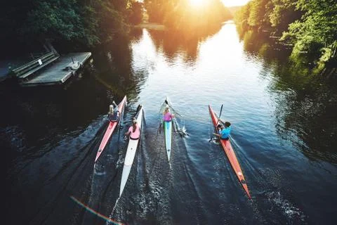 Team of rowing people Stock Photos