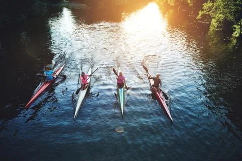 Team of rowing people Stock Photos