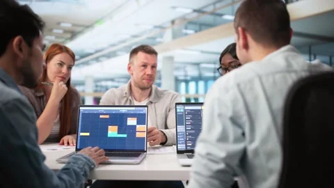 Team Scheduling Software. People Looking Stock Footage 314927709