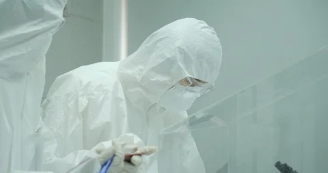 Team of scientist working in a secure high level research laboratory. Video stock 93812852