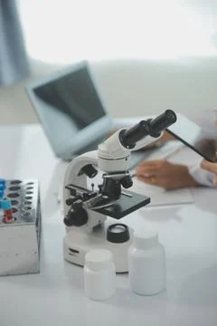 Team of Scientists Choose Between Printed Circuit Board to Work With. In Th.. Stock Photos