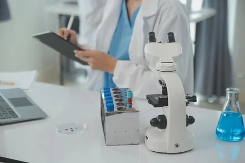 Team of Scientists Choose Between Printed Circuit Board to Work With. In Th.. Stock Photos