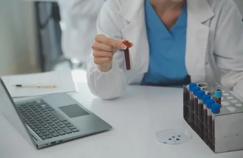 Team of Scientists Choose Between Printed Circuit Board to Work With. In Th.. Stock Photos