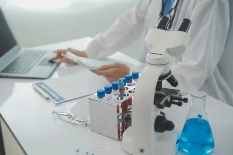 Team of Scientists Choose Between Printed Circuit Board to Work With. In Th.. Stock Photos