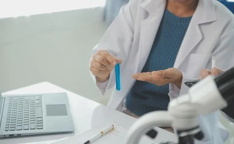 Team of Scientists Choose Between Printed Circuit Board to Work With. In Th.. Stock Photos