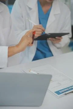 Team of Scientists Choose Between Printed Circuit Board to Work With. In Th.. Stock Photos