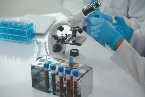 Team of Scientists Choose Between Printed Circuit Board to Work With. In Th.. Stock Photos