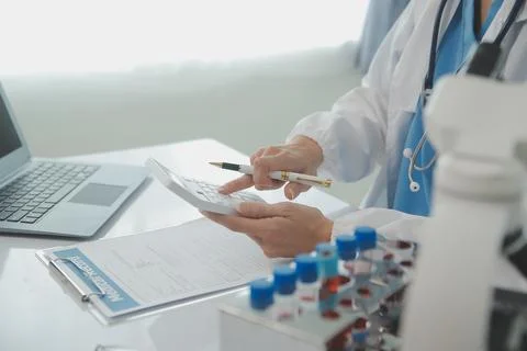 Team of Scientists Choose Between Printed Circuit Board to Work With. In Th.. Stock Photos