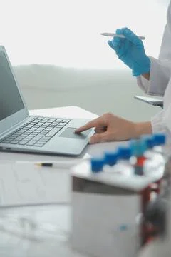 Team of Scientists Choose Between Printed Circuit Board to Work With. In Th.. Stock Photos
