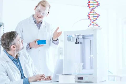 Team of scientists at laboratory Stock Photos