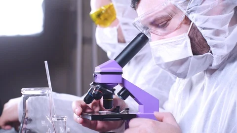 Team of scientists working in laboratory. Bio research. DNA science researcher. Stock-Footage 122762109