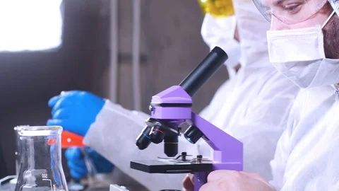 Team of scientists working in laboratory. Bio research. DNA science researcher. Stock-Footage 122762287