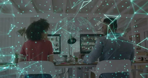 Team scrolling screens and clicking mouse showing 3D globe and fist bumping in Stock Footage 314707307